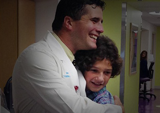 Dr. Ian Mitchell reunites with patient Michael Dominguez